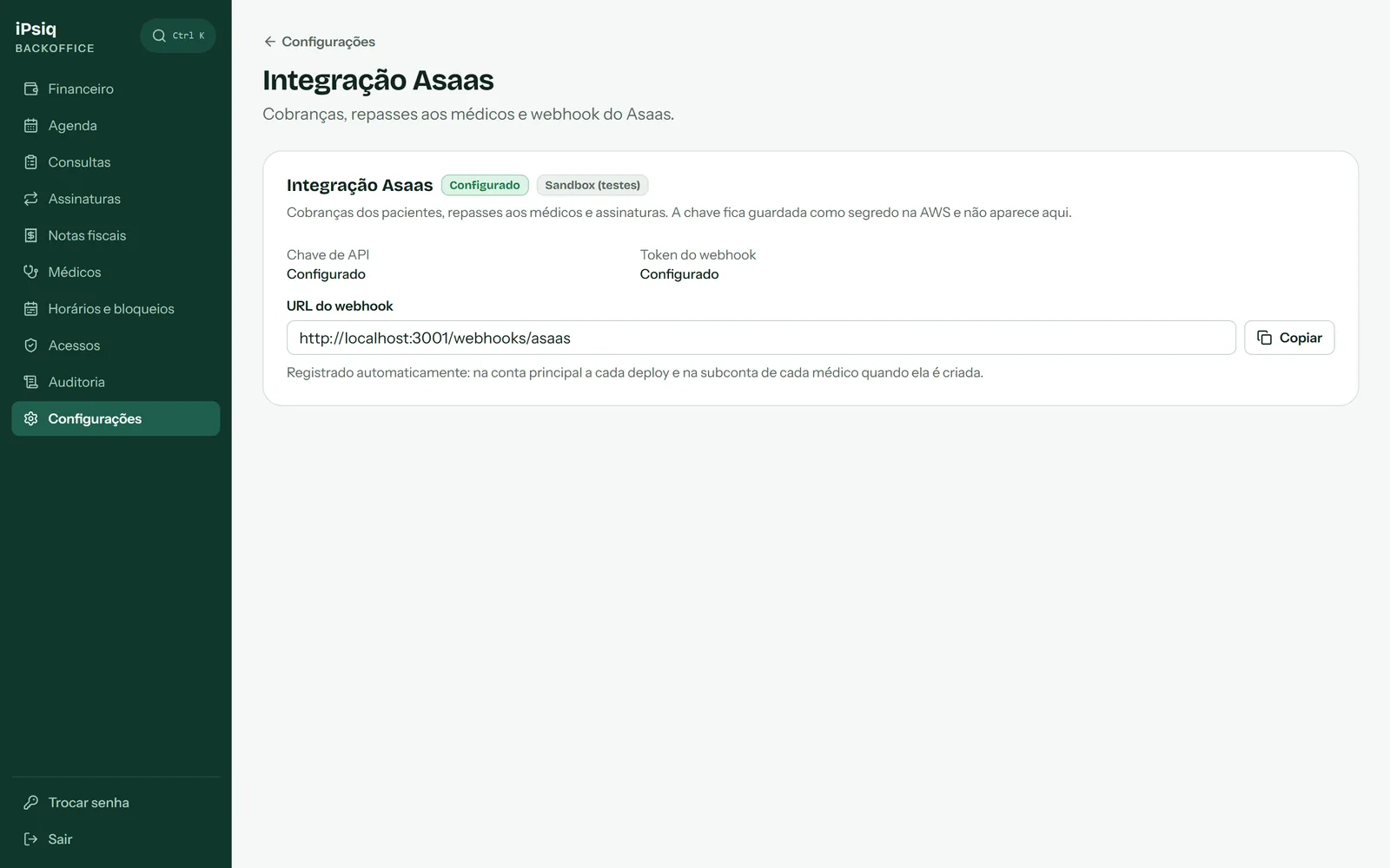 Payment provider integration screen, with the key configured but not displayed and the webhook URL